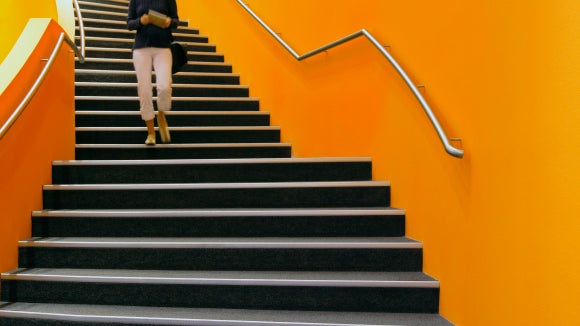walking-down-orange-staircase