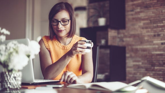 employee working remotely on laptop employee working remotely on laptop