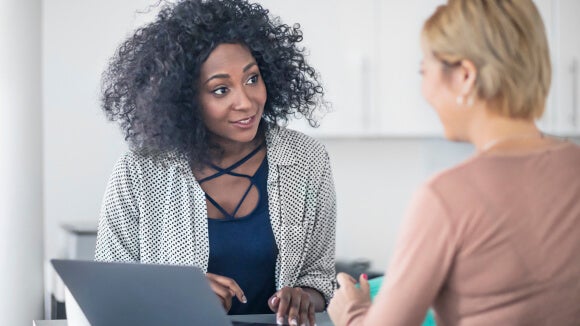 two women talking two women talking