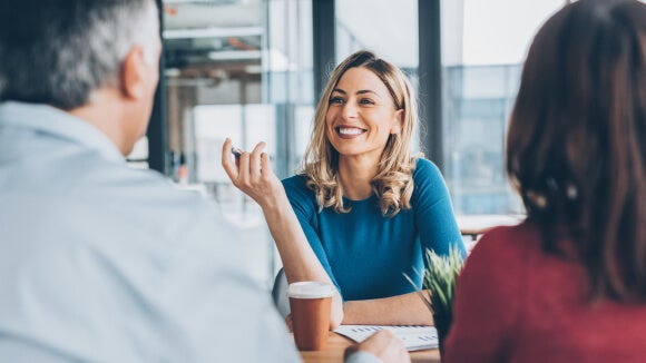 woman-in-meeting-in-office woman-in-meeting-in-office
