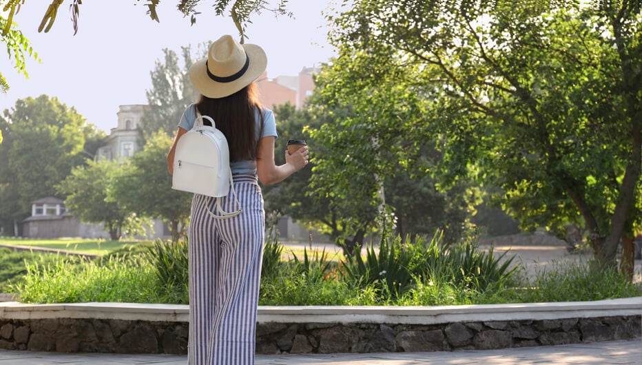 girl in park with coffee