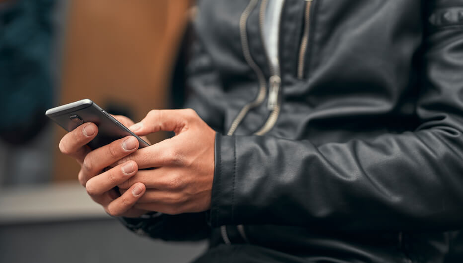 man using his mobile phone