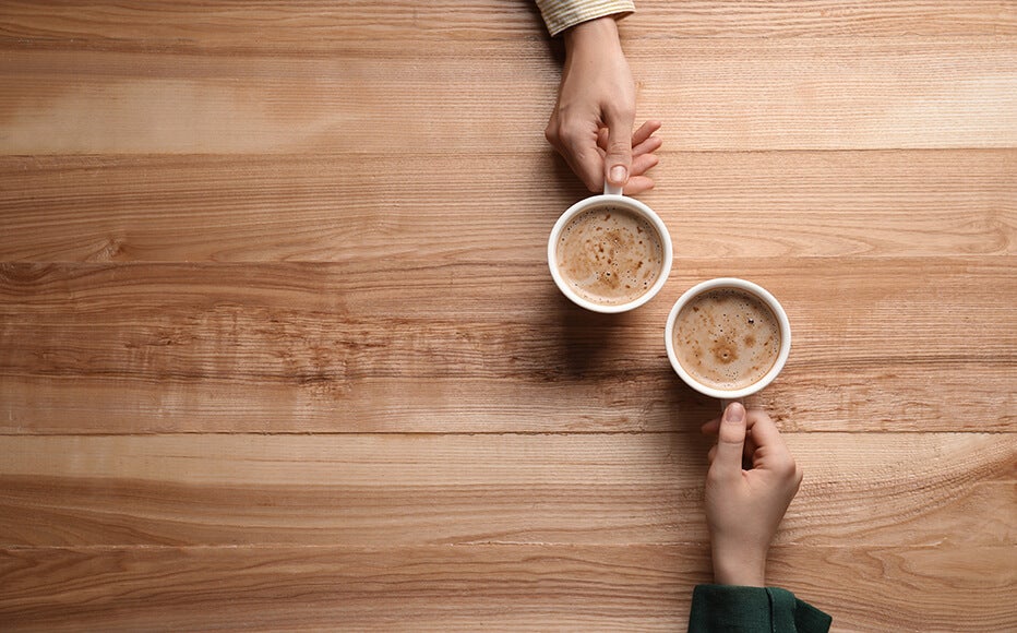 Two coffees on desk