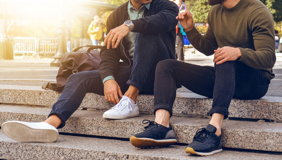 men sitting on stairs