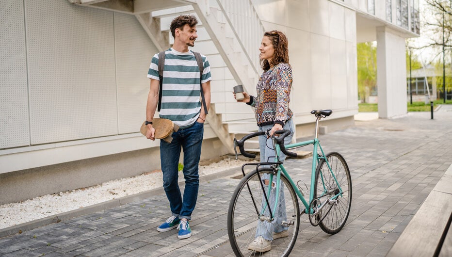man and woman with bike